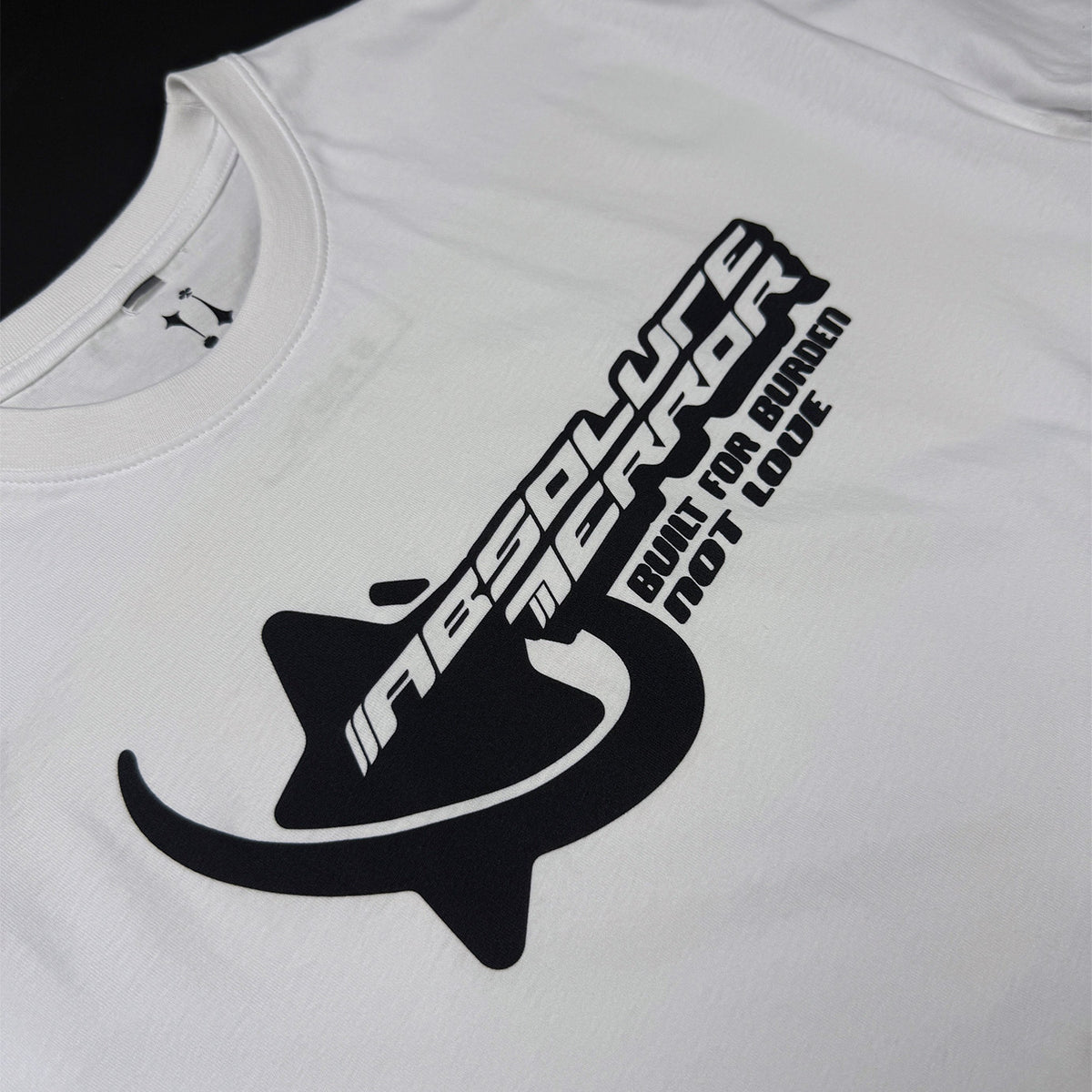 Y2K Tee in white, close-up of the chrome logo print