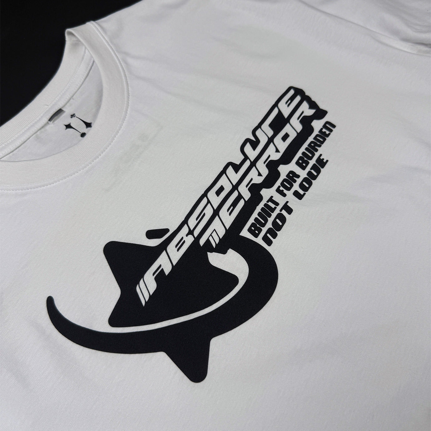 Y2K Tee in white, close-up of the chrome logo print